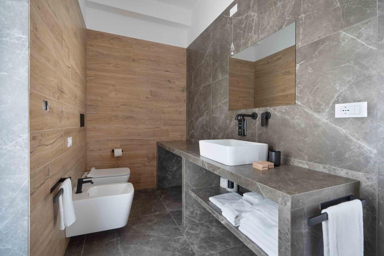 Hotel Mhami Пульсано Экстерьер фото